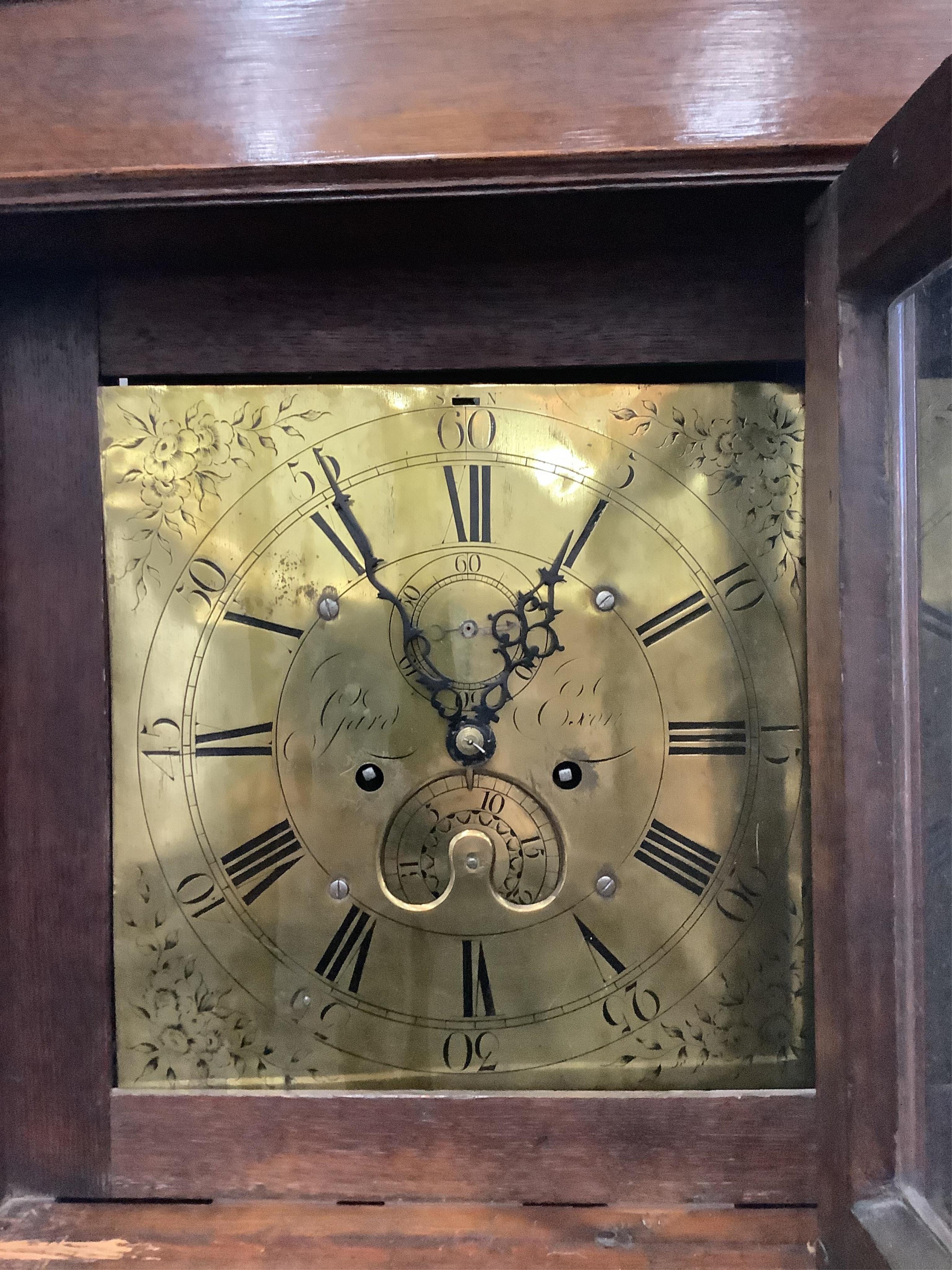 A late Georgian oak eight day longcase clock, by Gard, Oxon, height 225cm. Condition - fair